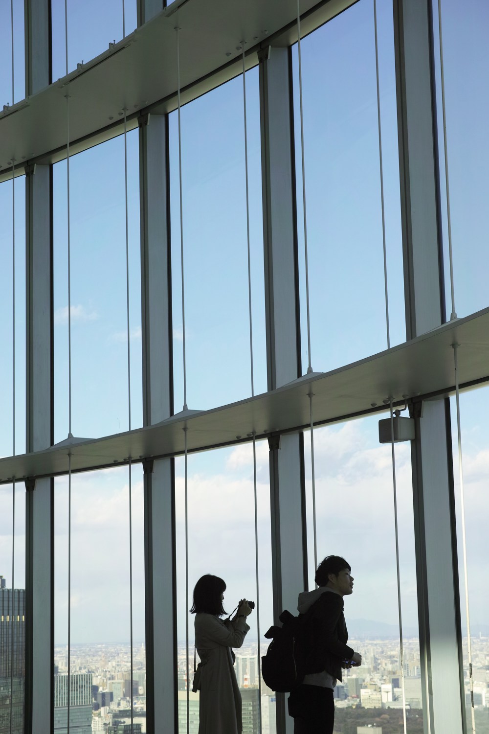 Les fenêtres du Tokyo City View donnant sur la baie de Tokyo, Roppongi, Japon.